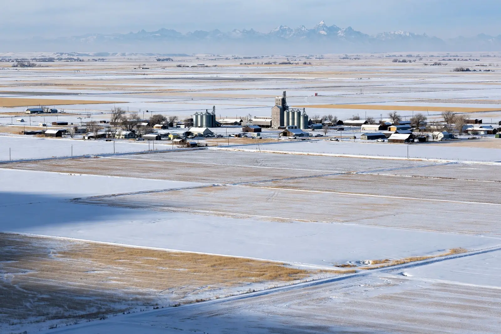 Burst Pipe & Freeze Water Damage Repair Elmore County, ID — an Idaho winter landscape in Elmore County with a service van