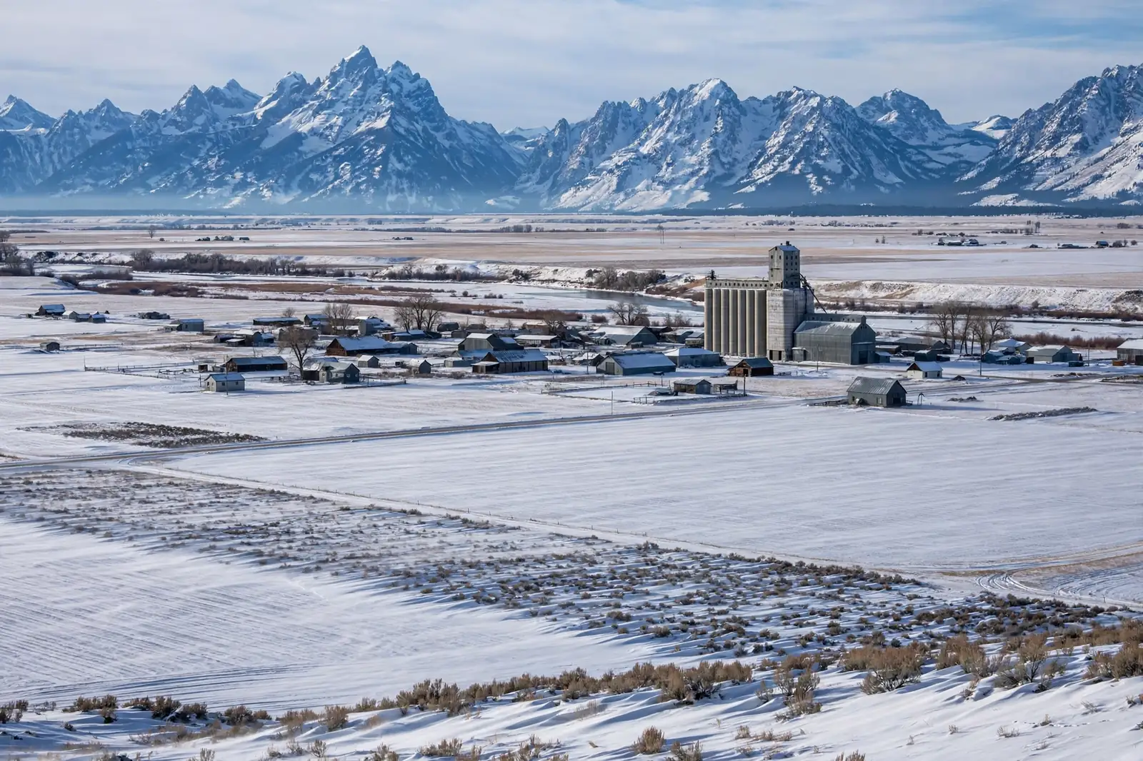 Burst Pipe & Freeze Water Damage Repair Fremont County, ID — an Idaho winter landscape in Fremont County with a service van