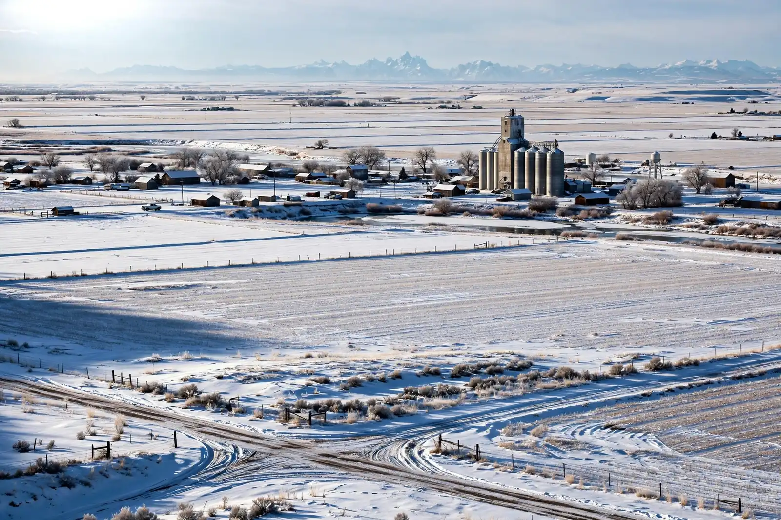 Burst Pipe & Freeze Water Damage Repair Oneida County, ID — an Idaho winter landscape in Oneida County with a service van